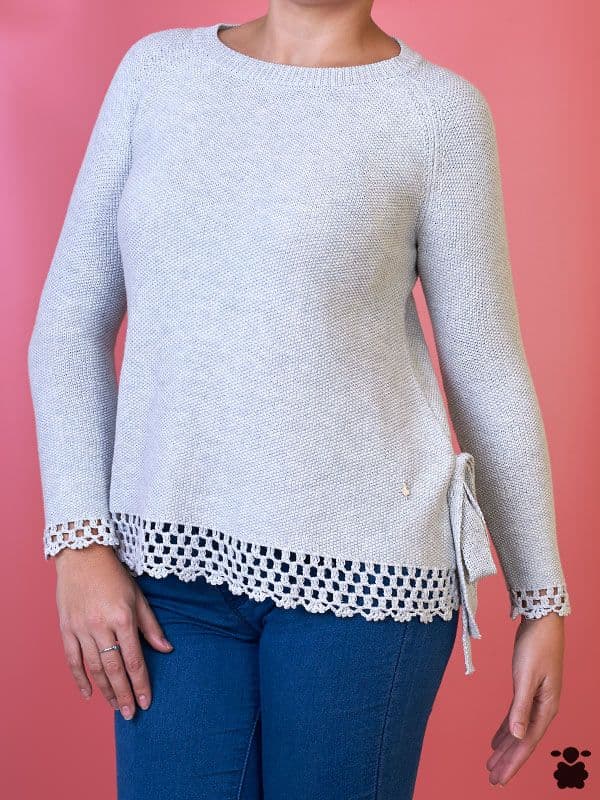 Jersey de punto gris con lazos